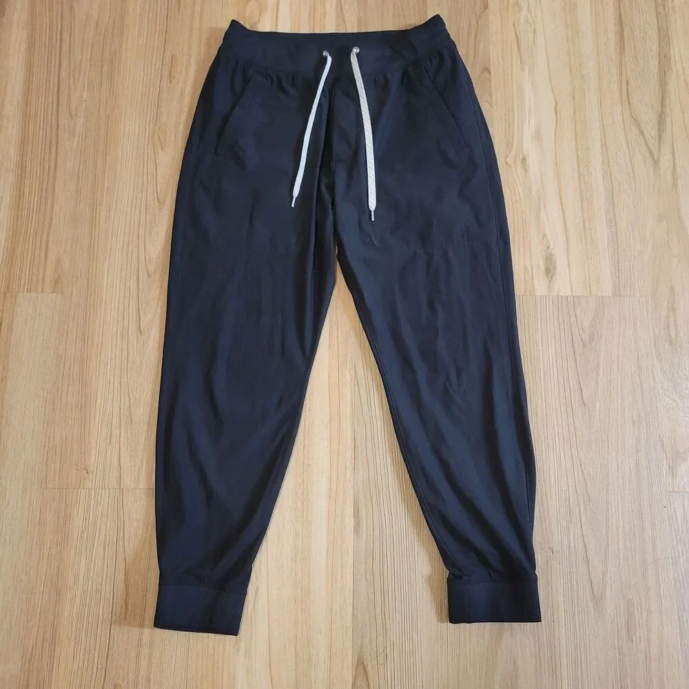 Vuori Meta Jogger Men Medium Black Drawstring Stretch Performance Pants V436